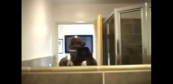  Chubby ebony whore with big back tattoo pissing in bathroom
